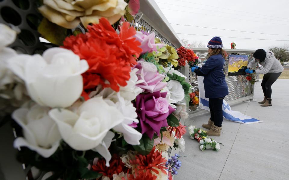 Items have been removed from the Walmart memorial and placed at Ponder Park.