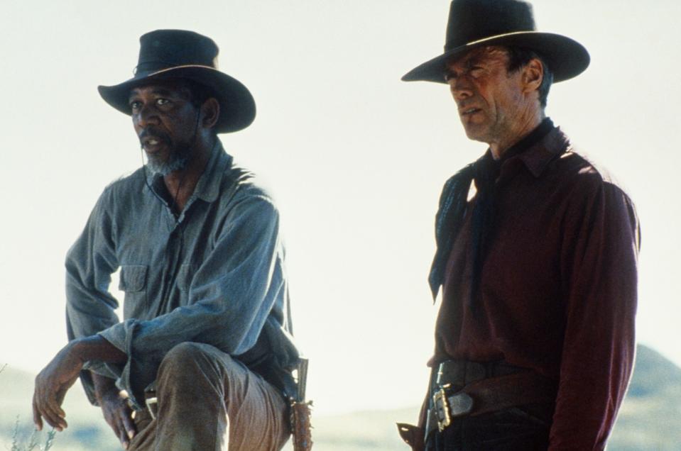 Morgan Freeman and Clint Eastwood wearing wide-brimmed hats