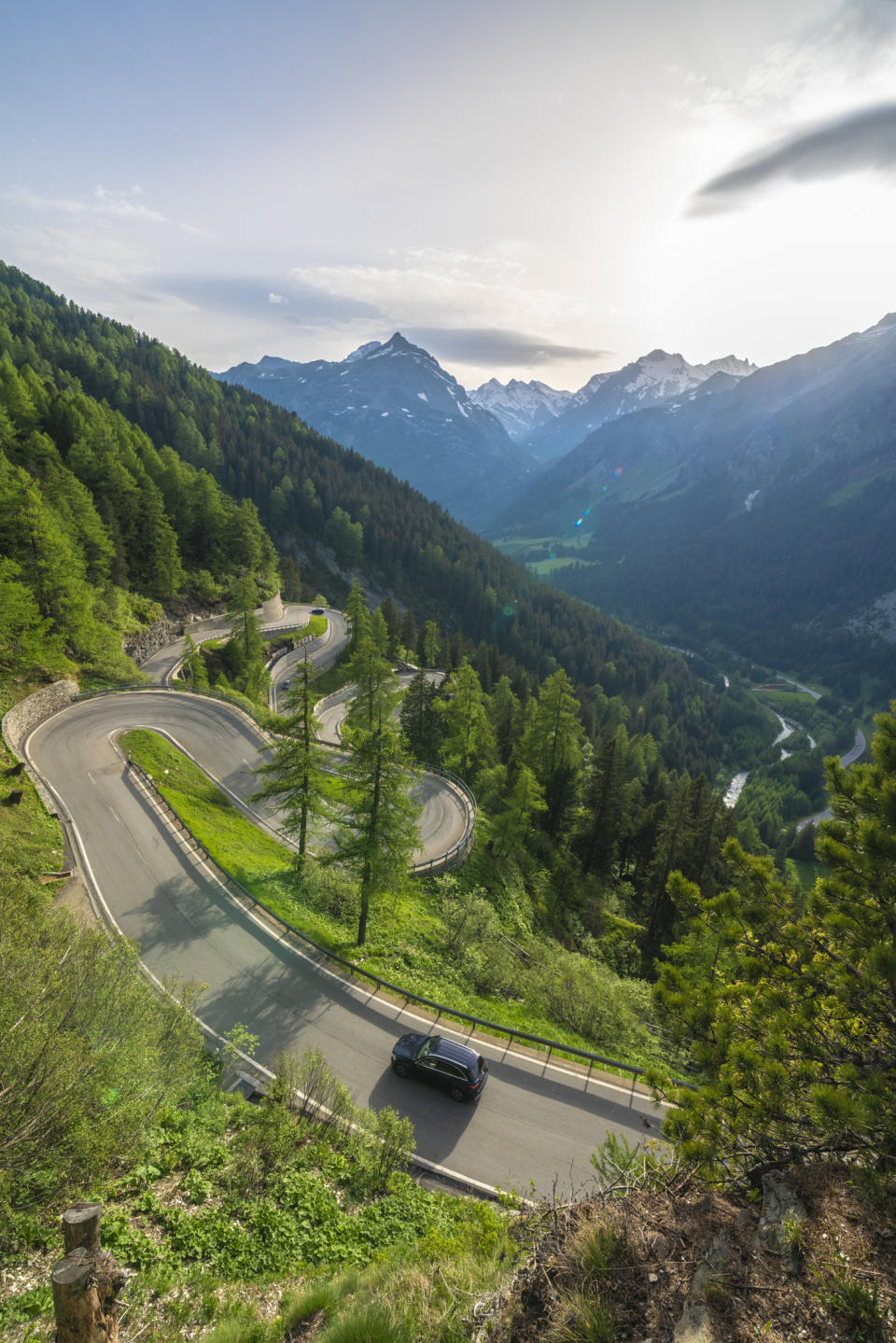 A car driving on a winding road