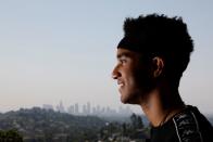 Adam Miguest ( @itsadamm ) poses for a portrait at the TIKTOK house "Kids Next Door" in the Hollywood hills of Los Angeles