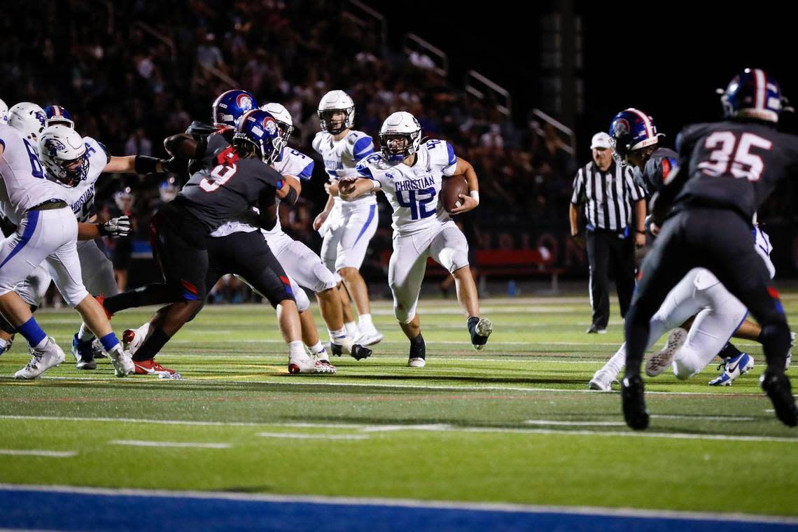 Lexington Christian’s Brady Hensley (42) runs the ball during a win at Christian Academy-Louisville on Sept. 8.