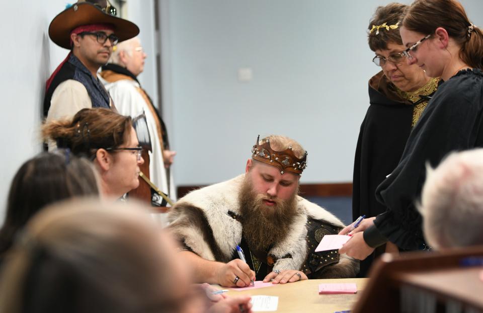 Signing up to speak during public comments at the February 6 Meeting of the Brevard County Commission in Viera. The meeting included many members of the public involved with the Brevard Renaissance Fair who were present to speak in favor of keeping the fair at Wickham Park in Melbourne.