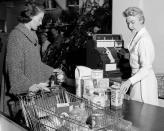 <p>In the '40s, grocery stores had to make their <a href="https://www.mentalfloss.com/article/26470/brief-history%E2%80%94and-future%E2%80%94-shopping-cart" rel="nofollow noopener" target="_blank" data-ylk="slk:checkout stands bigger;elm:context_link;itc:0;sec:content-canvas" class="link ">checkout stands bigger</a> to accommodate the amount of food shoppers bought at once with the new invention of carts.</p>