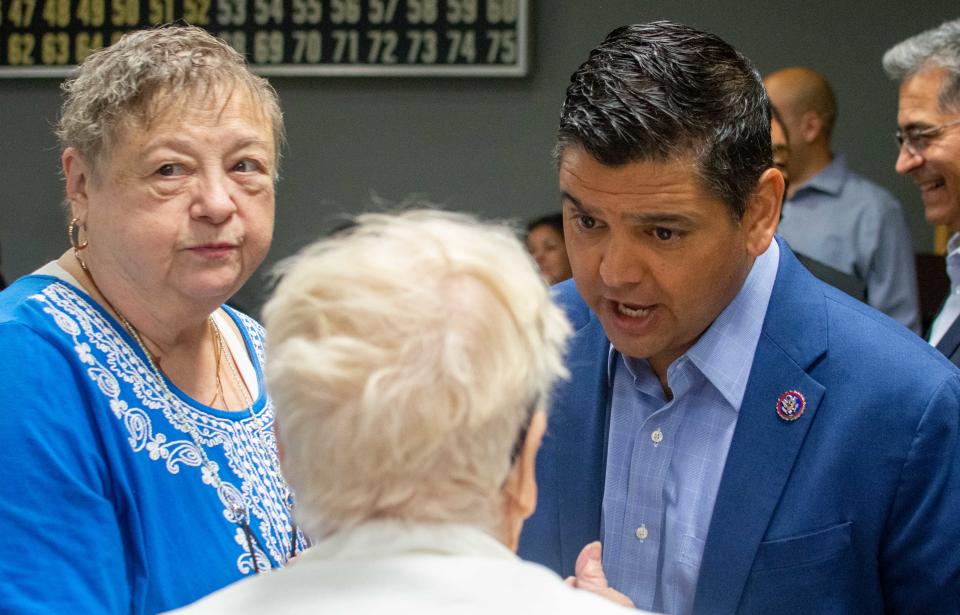 U.S. Rep. Raul Ruiz chats with seniors.