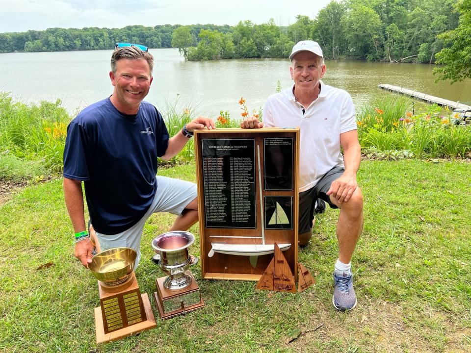 Your 2022 Interlake National Regatta winners: Crew member Jamie Jones, left, and skipper Matt Fisher. Jim Ward was also part of the winning team but is not pictured.