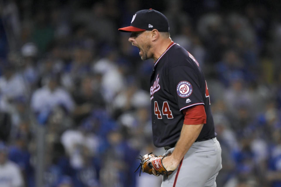 Washington Nationals relief pitcher Daniel Hudson celebrates after the final out in Game 2 of the baseball team's National League Division Series against the Los Angeles Dodgers on Friday, Oct. 4, 2019, in Los Angeles. The Nationals won 4-2. (AP Photo/Mark J. Terrill)