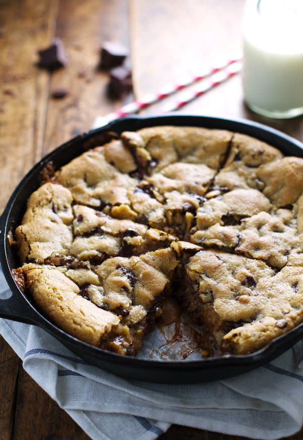 <strong>Get the <a href="http://pinchofyum.com/deep-dish-chocolate-chip-cookie-with-caramel-sea-salt" target="_blank">Deep Dish Chocolate Chip Cookie With Caramel And Sea Salt recipe</a> from Pinch of Yum</strong>