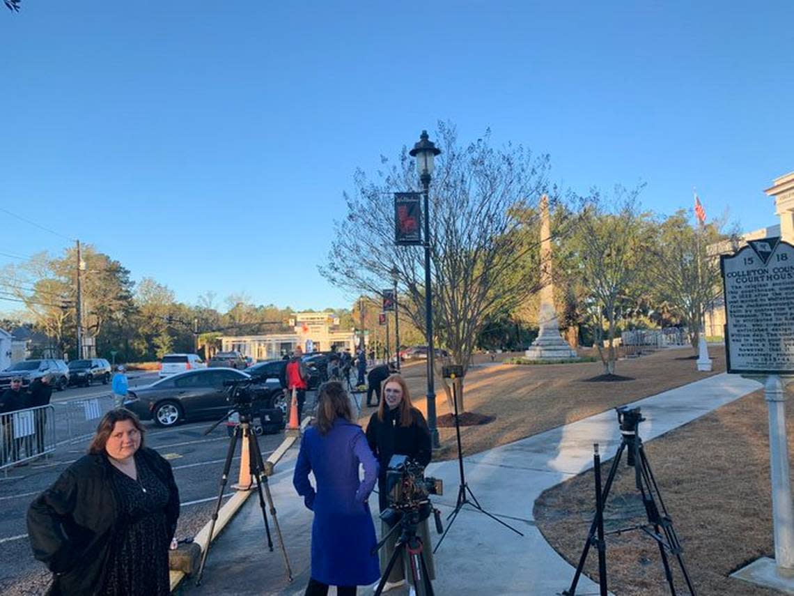 Media gather outside the Colleton County Courthouse ahead of the start of Alex Murdaugh’s murder trial on Monday, Jan. 23, 2023.