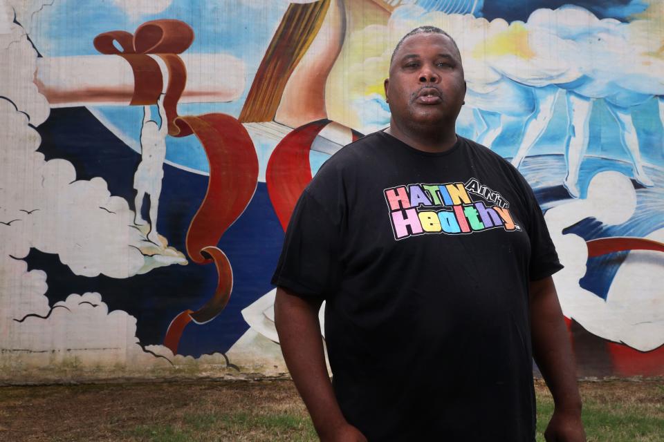 Terry 'T-Way' Holloway, who grew up in the Foote Homes public housing complex and later the Pine Hill neighborhood in South Memphis, councils youth in his old neighborhood in an attempt to keep them away from street violence. Holloway now sells T-shirts and urban gear with his uncle for the Black-owned label, Hatin Aint Healthy. 