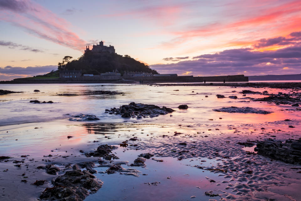 Sunset on the beach at Marazion with St Michaels Mount in the distance. (Getty Images)