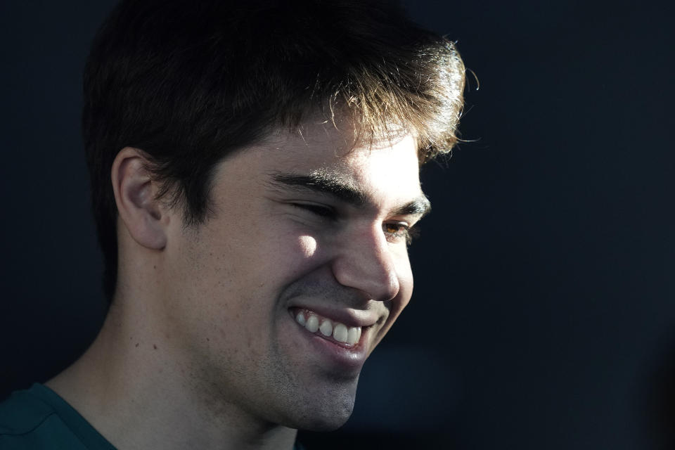 Aston Martin driver Lance Stroll of Canada reacts during an interview at the Bahrain International Circuit in Sakhir, Bahrain, Thursday, March 2, 2023. The Bahrain GP will be held on Sunday March 5, 2023.(AP Photo/Frank Augstein)