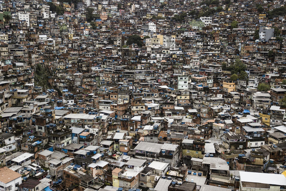 Homes cover a hill in the poor Rocinha favela of Rio de Janeiro, Brazil, Friday, Sept. 30, 2022. Brazil’s presidential election will be decided by tens of millions of poor people on Oct. 2. (AP Photo/Matias Delacroix)