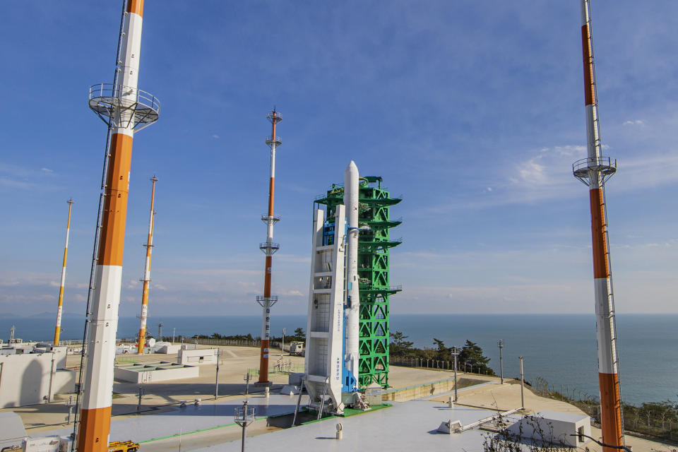 The Nuri rocket, the first domestically produced space rocket, sits on its launch pad at the Naro Space Center in Goheung, South Korea, Thursday, Oct. 21, 2021. South Korea was preparing to test-launch its first domestically produced space rocket Thursday in what officials describe as an important step in its pursuit of a satellite launch program. (Korea Pool via AP)