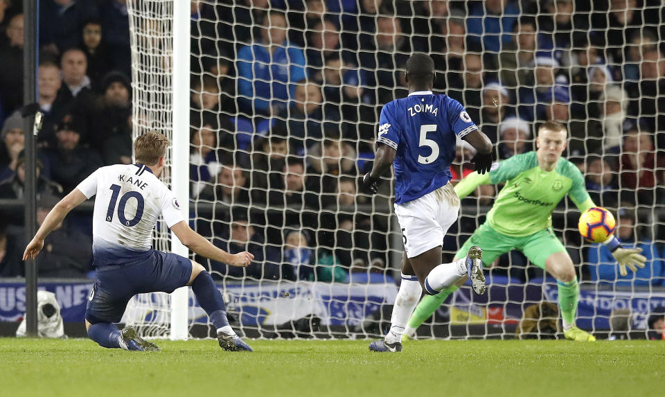 Harry Kane nets Tottenham’s sixth to leave them just two points behind second-placed Manchester City