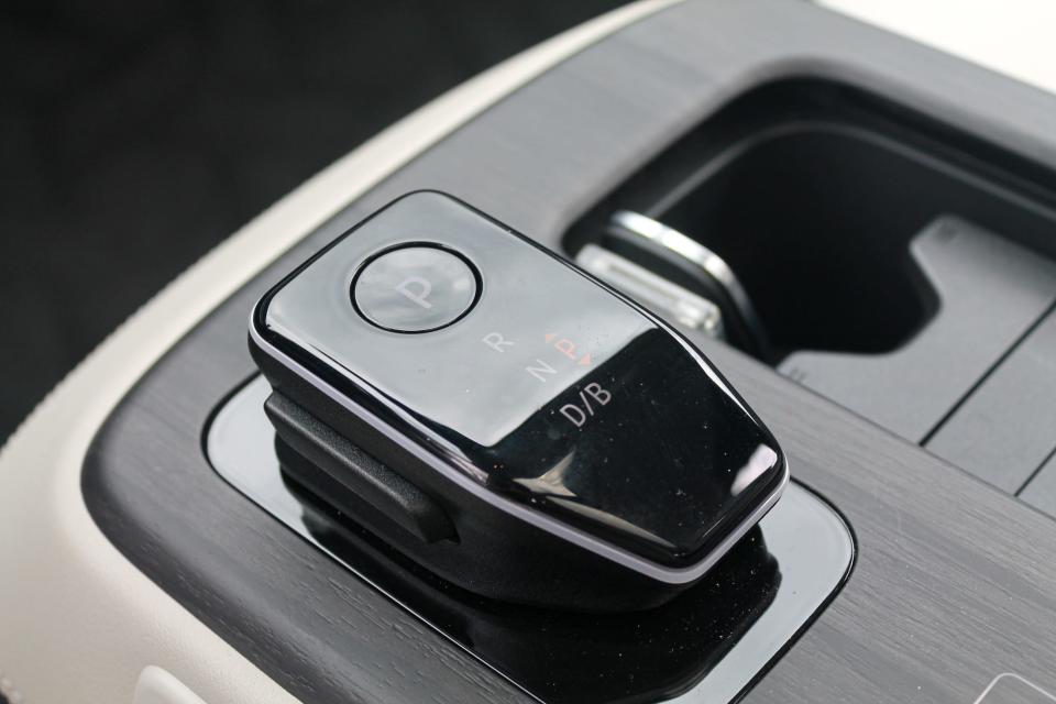 The shiny, black gear selector on the 2023 Nissan Ariya.