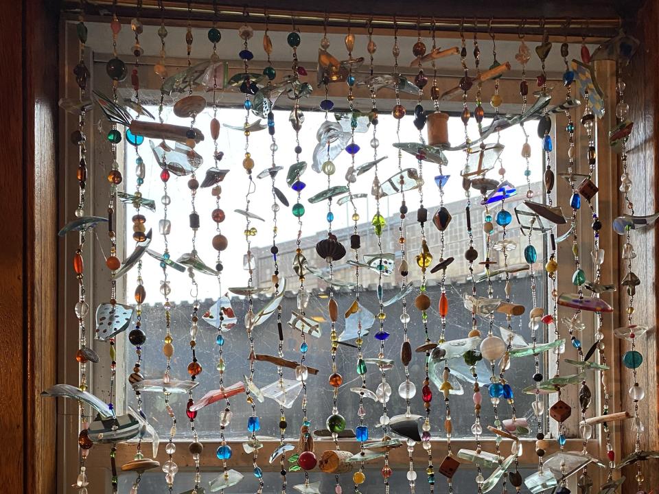 A curtain Victoria made out of broken glass found around the Yankee Ferry.