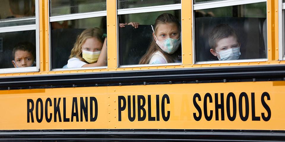 Students arrive at the Jefferson School in Rockland, where masks are required  both on the bus and in school, on Monday, Aug. 30, 2021.