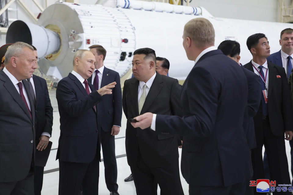 In this photo provided by the North Korean government, Russian President Vladimir Putin, second left, and North Korean leader Kim Jong Un visit the Vostochny cosmodrome outside the city of Tsiolkovsky, about 200 kilometers (125 miles) from the city of Blagoveshchensk in the far eastern Amur region, Russia, Wednesday, Sept. 13, 2023. Independent journalists were not given access to cover the event depicted in this image distributed by the North Korean government. The content of this image is as provided and cannot be independently verified. Korean language watermark on image as provided by source reads: "KCNA" which is the abbreviation for Korean Central News Agency. (Korean Central News Agency/Korea News Service via AP)