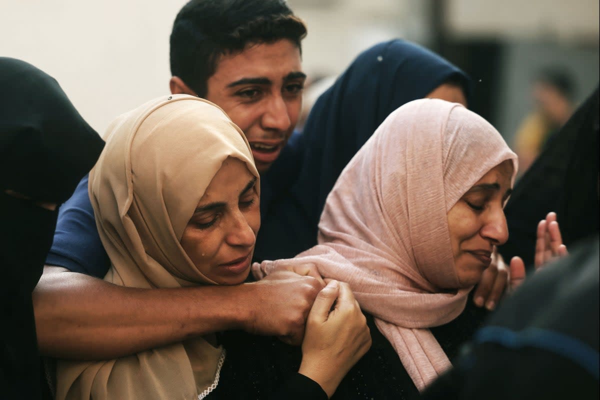 Palestinians outside Najjar hospital in southern Gaza (AFP via Getty Images)