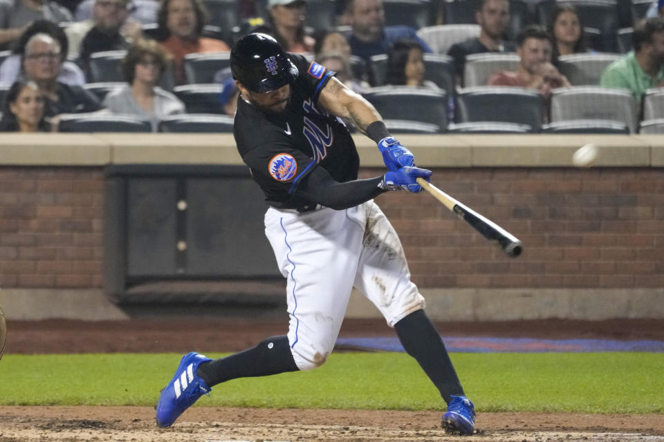 New York Mets' Tommy Pham hits a solo home run against the San Francisco Giants during the sixth inning of a baseball game Friday, June 30, 2023, in New York. (AP Photo/Mary Altaffer)