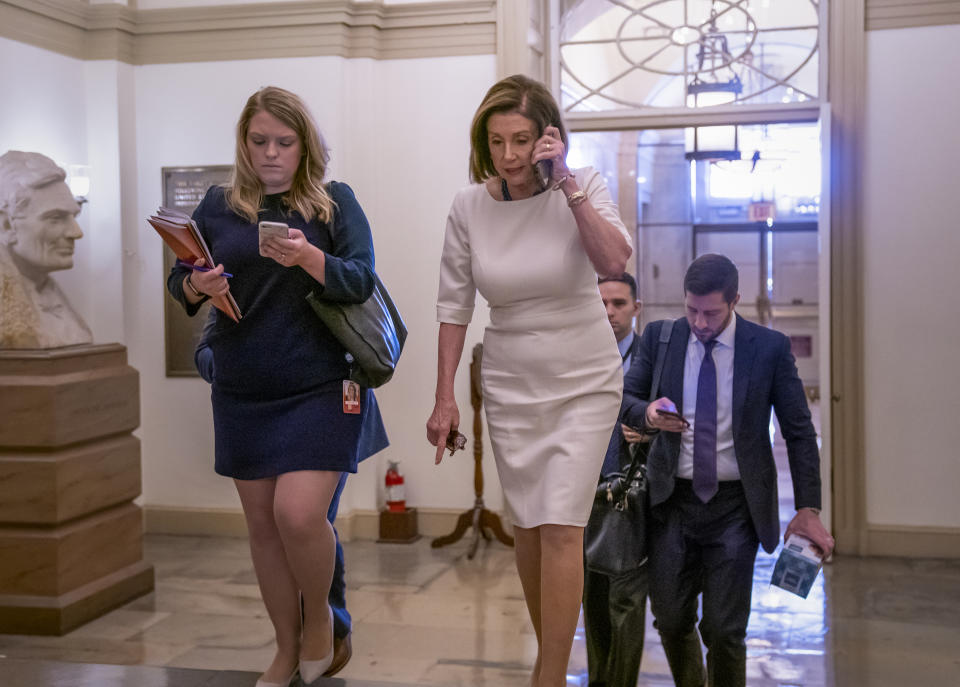 Speaker of the House Nancy Pelosi, D-Calif., arrives at the Capitol in Washington, Thursday, Sept. 26, 2019, just as Acting Director of National Intelligence Joseph Maguire is set to speak publicly for the first time about a secret whistleblower complaint involving President Donald Trump. Pelosi committed Tuesday to launching a formal impeachment inquiry against Trump. (AP Photo/J. Scott Applewhite)