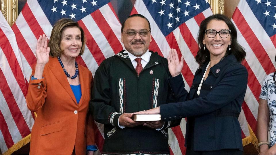 PHOTO: In this Sept. 13, 2022, file photo, Speaker of the House Nancy Pelosi administers the House oath of office to Rep. Mary Peltola, standing next to her husband Eugene 'Buzzy' Peltola Jr., during a swearing-in on Capitol Hill in Washington, D.C. (Jose Luis Magana/AP, FILE)