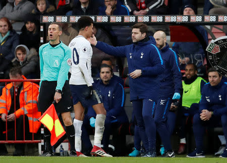 Soccer Football - Premier League - AFC Bournemouth vs Tottenham Hotspur - Vitality Stadium, Bournemouth, Britain - March 11, 2018. Tottenham's Dele Alli walk past manager Mauricio Pochettino as he is substituted after sustaining an injury. Action Images via Reuters/Matthew Childs