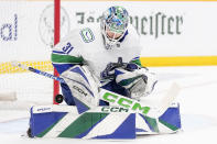 Vancouver Canucks goaltender Arturs Silovs (31) blocks a shot on goal against the Nashville Predators during the second period in Game 4 of an NHL hockey Stanley Cup first-round playoff series Sunday, April 28, 2024, in Nashville, Tenn. (AP Photo/George Walker IV)