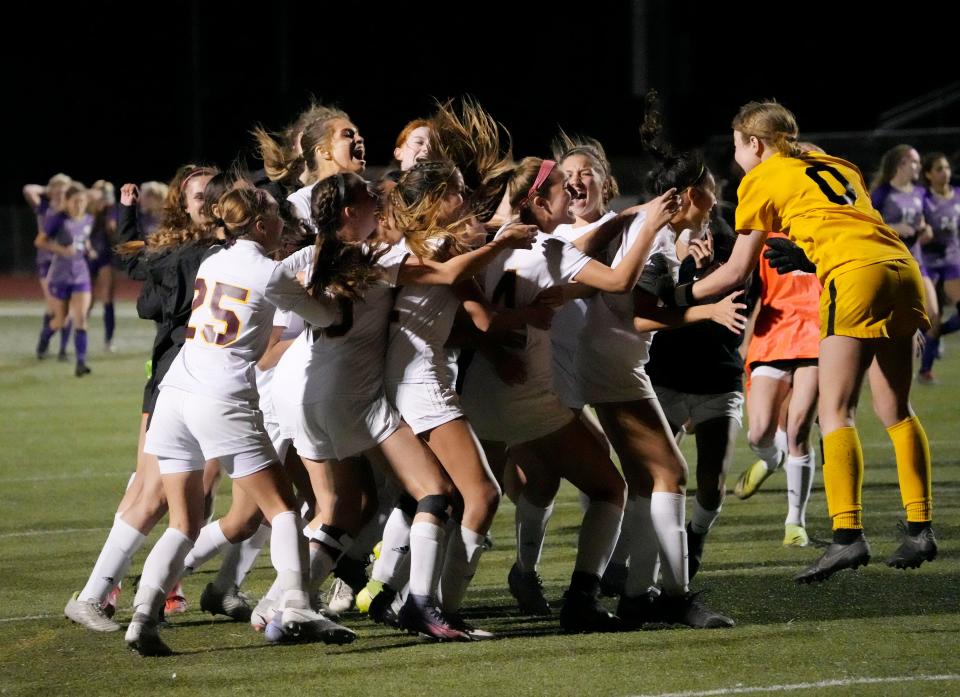 Feb 22, 2022; Gilbert, Arizona, United States;  Salpointe Catholic players celebrate their State 4A girls soccer championship against Notre Dame Prep at Williams Field High School. Mandatory Credit: Michael Chow-Arizona Republic