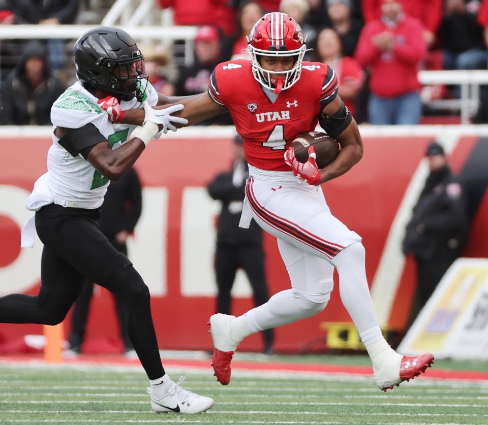 Utah Utes wide receiver Munir McClain (4) runs after a catch against Oregon Ducks defensive back Khyree Jackson (5) in Salt Lake City on Saturday, Oct. 28, 2023. Oregon won 35-6. | Jeffrey D. Allred, Deseret News