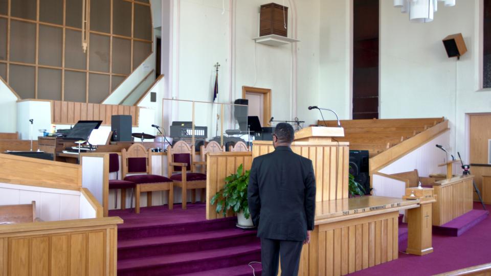 Rev. Julius D. Jackson Jr. stands in the same spot as his father did in 1971 after the Mt. Vernon Baptist Church bombing.