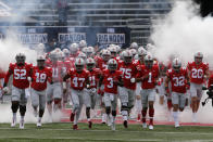 Ohio State players run on to the field for the start of their NCAA college football game against Nebraska Saturday, Oct. 24, 2020, in Columbus, Ohio. (AP Photo/Jay LaPrete)