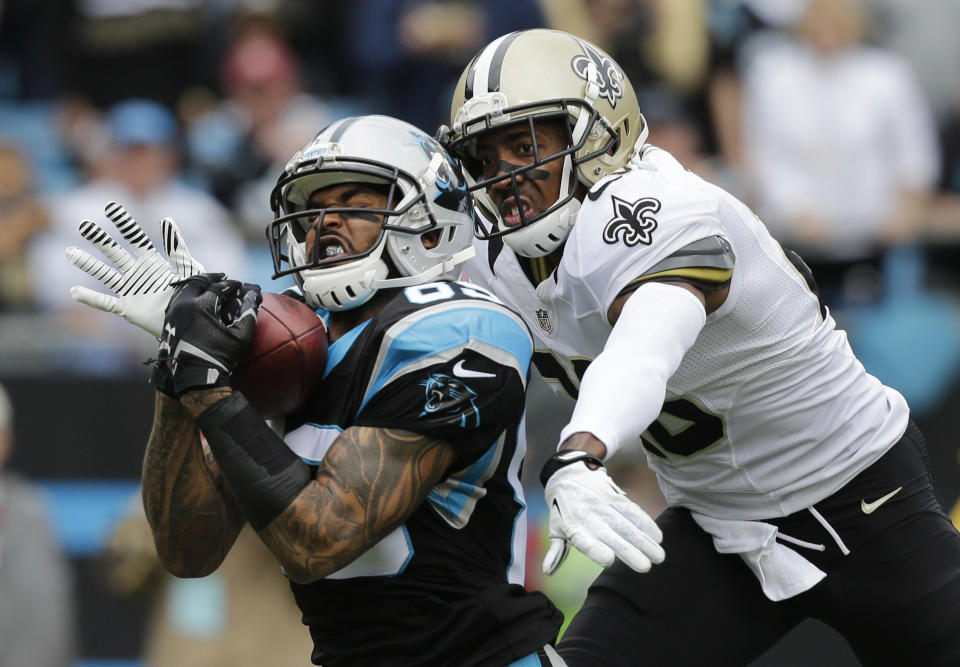 FILE - In this Dec. 22, 2013 file photo, Carolina Panthers' Steve Smith, left, catches a pass as New Orleans Saints' Keenan Lewis, right, defends in the first half of an NFL football game in Charlotte, N.C.The agent for Smith says the five-time Pro Bowl selection has played his final snap for the Panthers. Smith's longtime representative Derrick Fox told The Associated Press on Wednesday, March 12, 2014, that Smith "is not going to play for the Panthers next year, I know that. I just don't know when that transaction is going to take place." (AP Photo/Chuck Burton, File)
