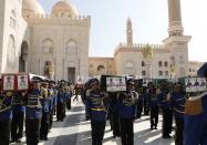 Honour guards carry coffins of Houthi fighters killed in recent fighting against government forces in Yemen's oil-rich province of Marib, during a funeral procession in Sanaa, Yemen