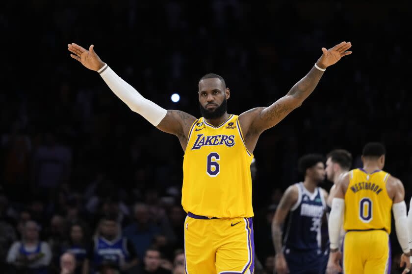 Lakers' LeBron James (6) gestures during the second half of the team's NBA basketball game against the Dallas Mavericks