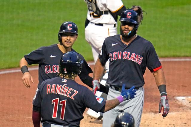 Cleveland Guardians' Josh Naylor, left, and Steven Kwan celebrate