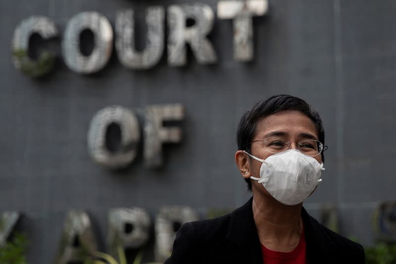 Filipino journalist and Rappler CEO Maria Ressa speaks to the media after testifying before the Court of Tax Appeals in Quezon City