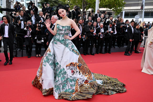 Chinese actress Zhou Dongyu poses as she arrives on the red carpet