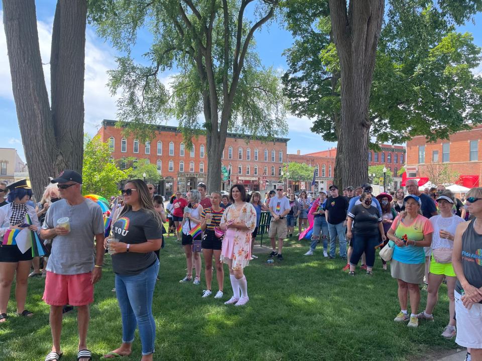 Hundreds of people gather in front of the historic Livingston County Courthouse in Howell on Sunday, June 20, 2021, before participating in a Pride Parade.