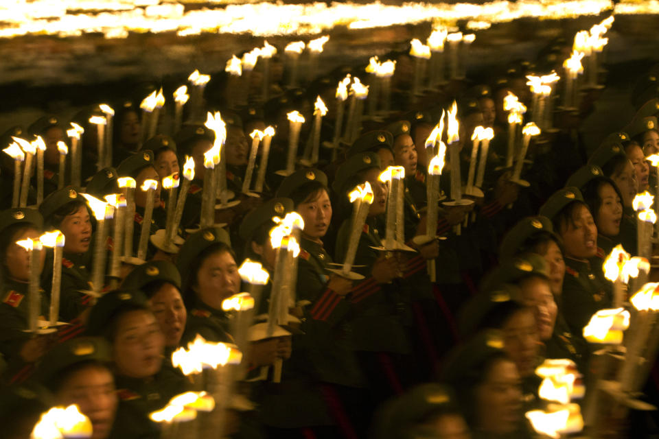 North Korean military cadets take part in a torch light march held in conjunction with the 70th anniversary of North Korea's founding day celebrations in Pyongyang, North Korea, Monday, Sept. 10, 2018. (AP Photo/Ng Han Guan)