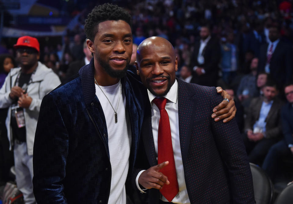 February 18, 2018; Los Angeles, CA, USA; Film actor Chadwick Boseman poses for a photo with boxer Floyd Mayweather Jr. during the 2018 NBA All Star Game at Staples Center. Mandatory Credit: Bob Donnan-USA TODAY Sports
