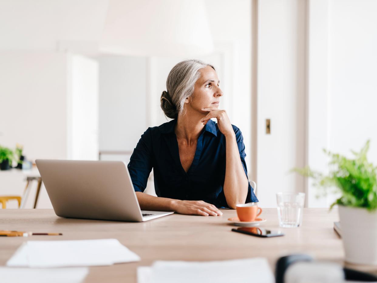 Businesswoman working on laptop in office