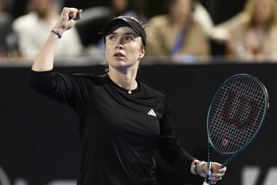 Elina Svitolina of Ukraine reacts after defeating Marie Bouzkova from the Czech Republic during their quarterfinal match at the ASB Tennis Classic in Auckland, New Zealand, Friday, Jan. 5, 2024. (Brett Phibbs/Photosport via AP)