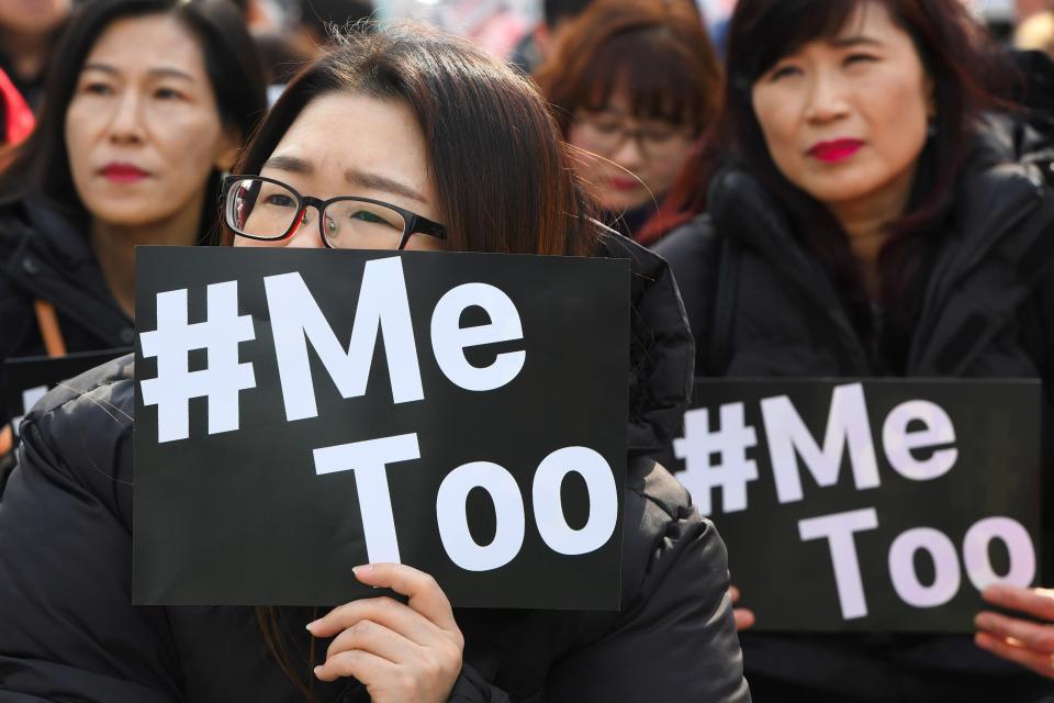 South Korean demonstrators hold banners during a rally to mark International Women's Day as part of the country's #MeToo movement.