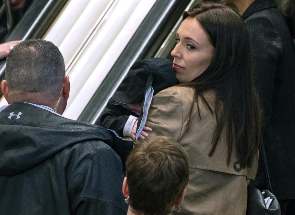 FILE - In this Sept. 25, 2018, file photo, New Zealand Prime Minister Jacinda Ardern arrives holding her child Neve during the 73rd session of the United Nations General Assembly, at U.N. headquarters. It's not unheard of for politicians to sometimes bring their children to work. Providence, R.I., Mayor Jorge Elorza occasionally brings his son Omar to events, as does Washington, D.C., Mayor Muriel Bowser with her daughter, Miranda. (AP Photo/Craig Ruttle, File)