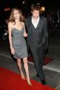 <b>Angelina Jolie & Brad Pitt</b><br><br>It seems that Mr. Pitt is a repeat offender! Donning tailored pieces in grey suiting materials, the power couple arrived at the Toronto International Film Festival in 2007 looking like they stepped out of a Banana Republic catalogue.
