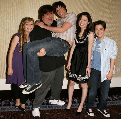 <p>Jason Merritt/FilmMagic</p> Dan Schneider with the iCarly cast