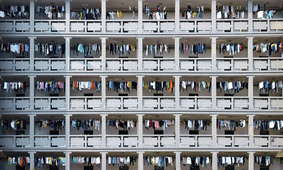 Image: An apartment building in Chongqing, the largest municipality in southwest China. (Zhou Zhiyong / AP file)