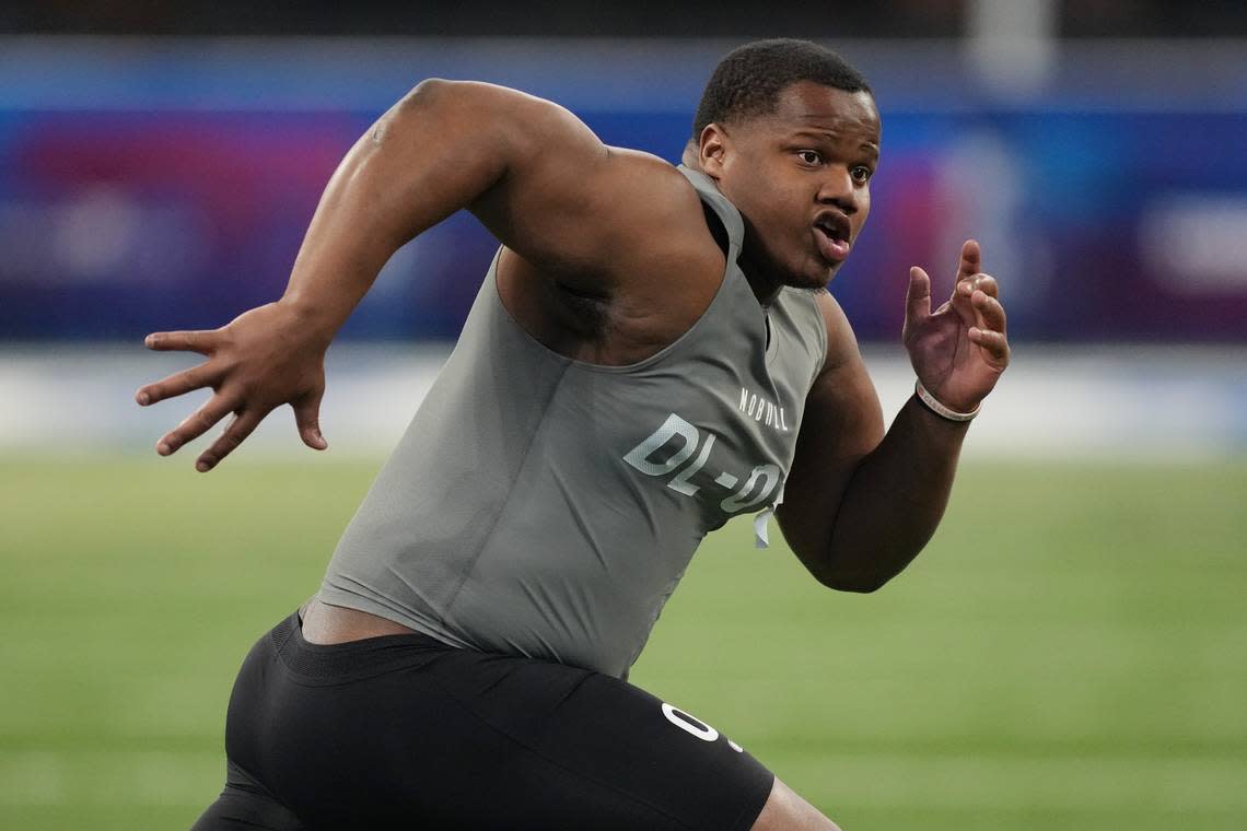 Feb 29, 2024; Indianapolis, IN, USA; Clemson defensive lineman Tyler Davis (DL03) works out during the 2024 NFL Combine at Lucas Oil Stadium.