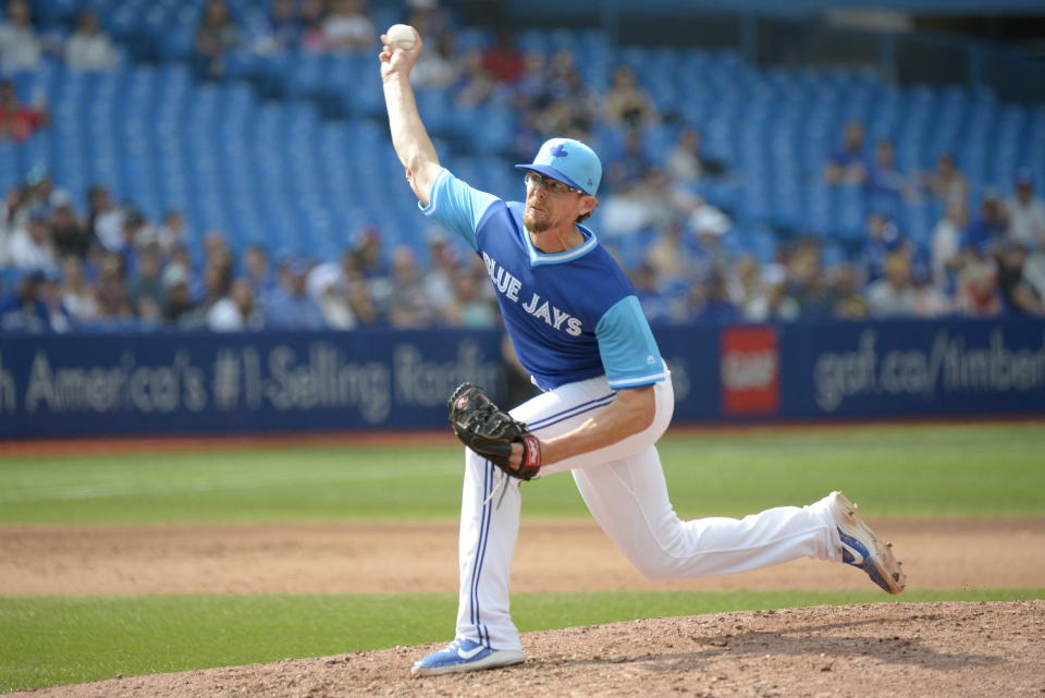 Toronto Blue Jays relief pitcher Tyler Clippard throws against the Philadelphia Phillies during the eighth inning of a baseball game Sunday, Aug. 26, 2018, in Toronto. (Jon Blacker/The Canadian Press via AP)